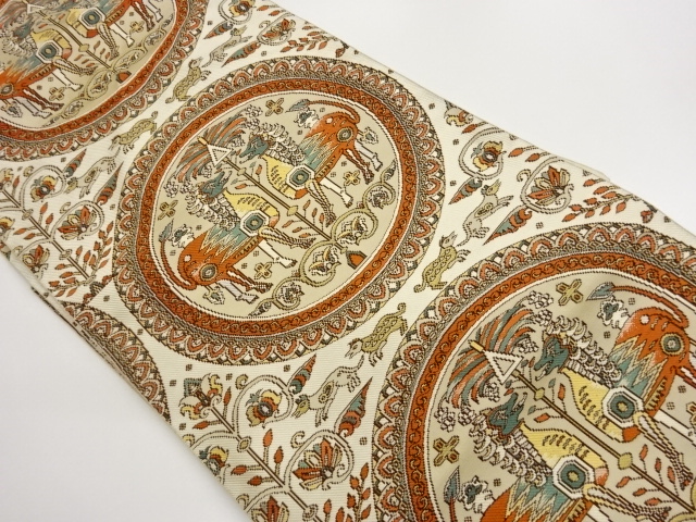 丸文に向かい動物・花唐草模様織出し名古屋帯